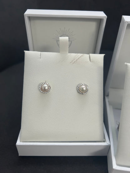 Pearl earrings with crystal surround Earrings